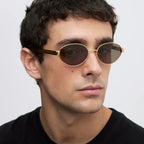 MELLER Sonnenbrille Karam - gold kakao